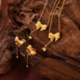 Titanium Steel Bow Earrings - Trendsi - Flyclothing LLC