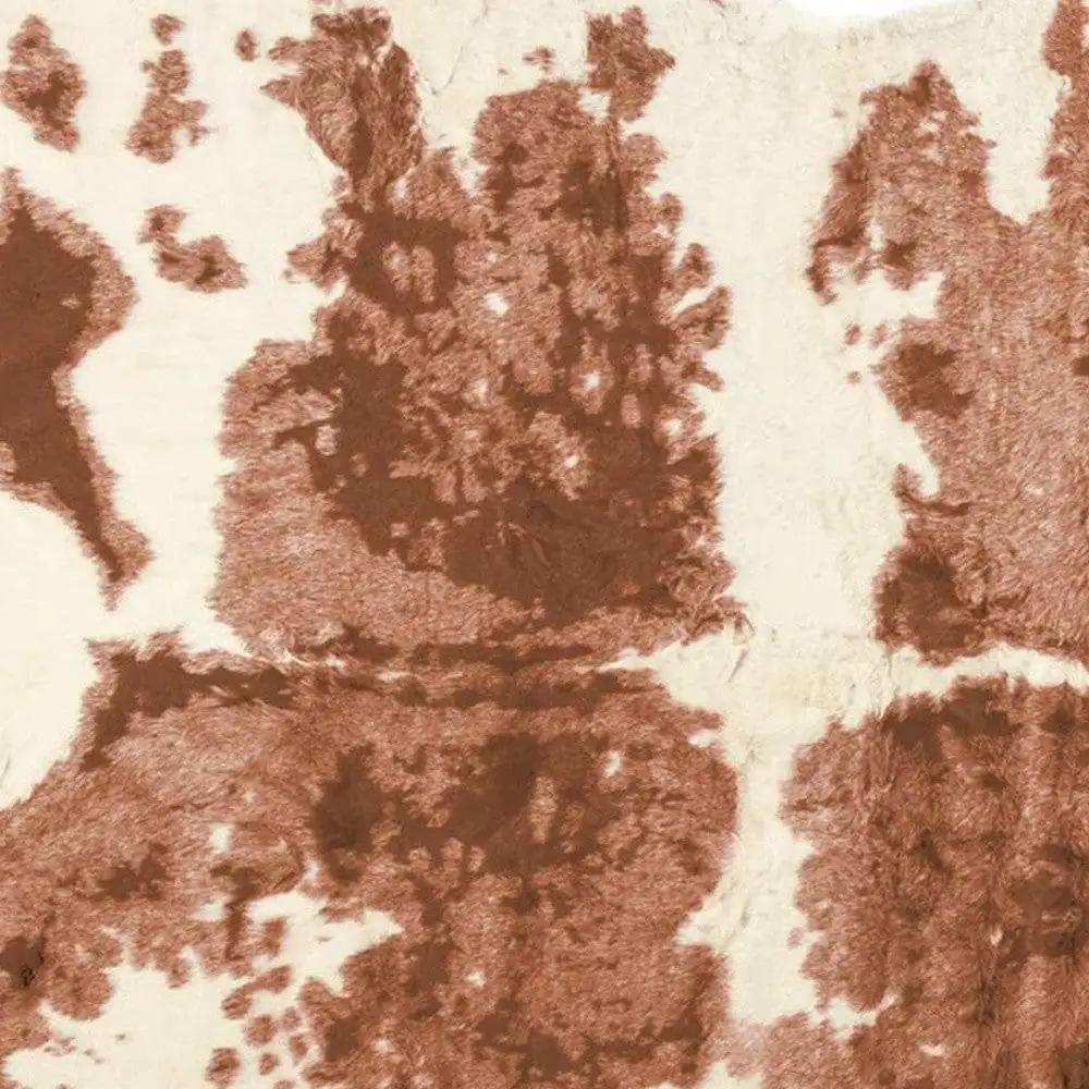 4' X 5' Brown and Ivory Faux Cowhide Animal Print Printed Area Rug - Homeroots - Flyclothing LLC