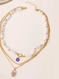 Layered Pearl Chain Evil Eye Hamsa Pendant Necklace - Trendsi - Flyclothing LLC
