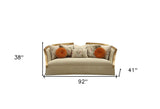 41" Beige Velvet Curved Sofa And Toss Pillows With Natural Legs - Homeroots - Flyclothing LLC