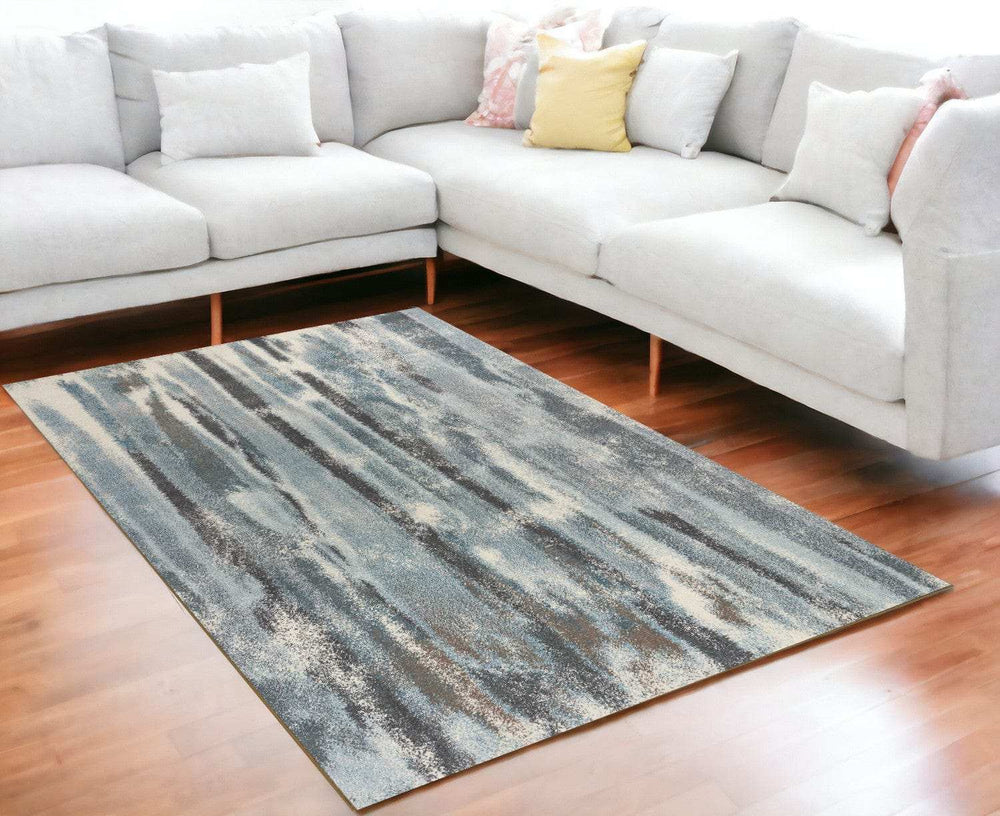 5' X 8' Teal Abstract Brushstrokes Indoor Area Rug - Homeroots - Flyclothing LLC