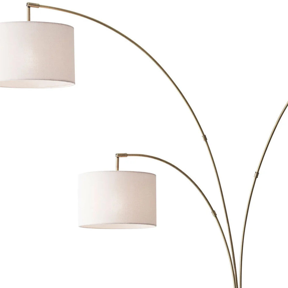 74" Brass Three Light Arc Floor Lamp With Off White Fabric Drum Shade - Homeroots - Flyclothing LLC