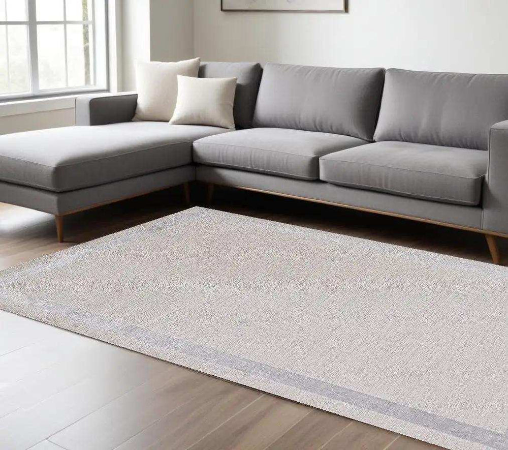 8' X 11' Ivory Silver Machine Woven Bordered Indoor Area Rug - Homeroots - Flyclothing LLC