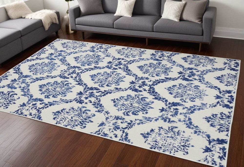 6' X 9' Blue And Ivory Floral Dhurrie Area Rug - Homeroots - Flyclothing LLC