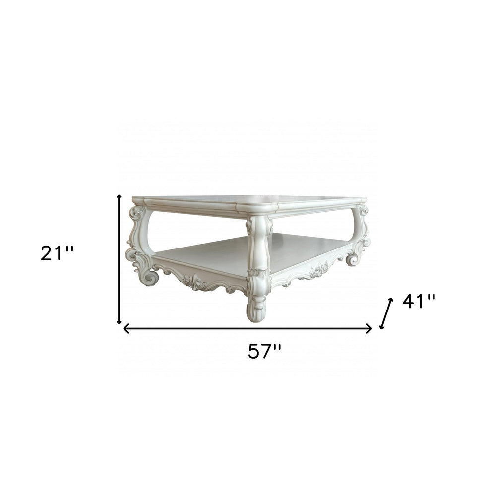 57" Antiqued White Wood Coffee Table With Shelf
