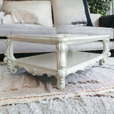 57" Antiqued White Wood Coffee Table With Shelf