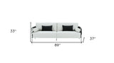 89" White Sofa And Toss Pillows With Silver Legs