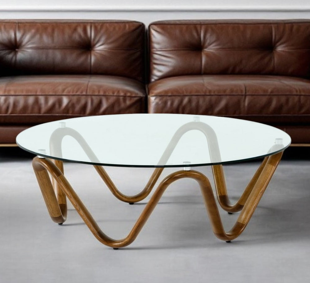 45" Clear and Brown Glass And Solid Wood Round Abstract Coffee Table