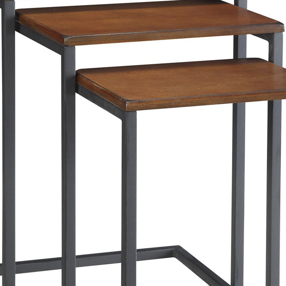 Set of Three Brown and Black Distressed Solid Wood and Metal Frame Nested Tables