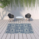 7' X 10' Blue and Ivory Geometric Stain Resistant Indoor Outdoor Area Rug - Homeroots - Flyclothing LLC