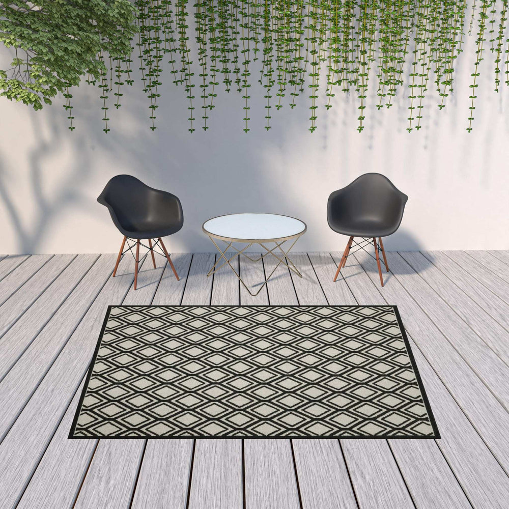7' X 9' Beige and Black Geometric Stain Resistant Indoor Outdoor Area Rug - Homeroots - Flyclothing LLC