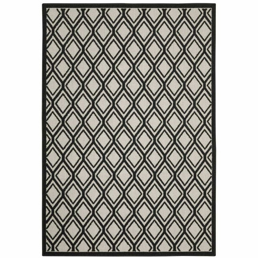 7' X 9' Beige and Black Geometric Stain Resistant Indoor Outdoor Area Rug - Homeroots - Flyclothing LLC