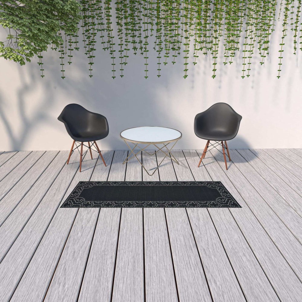 2' X 8' Black and Ivory Stain Resistant Indoor Outdoor Area Rug - Homeroots - Flyclothing LLC