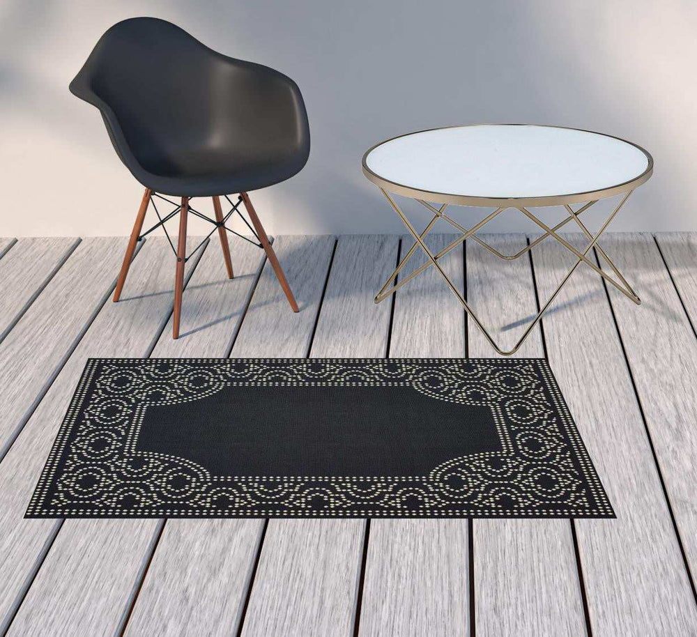 2' X 4' Black and Ivory Stain Resistant Indoor Outdoor Area Rug - Homeroots - Flyclothing LLC