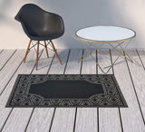 2' X 4' Black and Ivory Stain Resistant Indoor Outdoor Area Rug - Homeroots - Flyclothing LLC