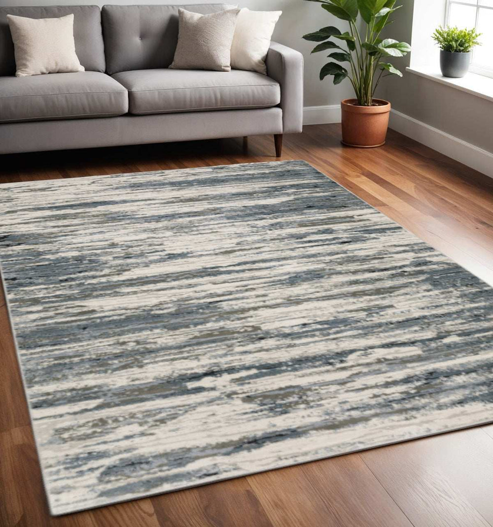 5' X 8' Blue Grey Beige And Brown Abstract Power Loom Stain Resistant Area Rug - Homeroots - Flyclothing LLC