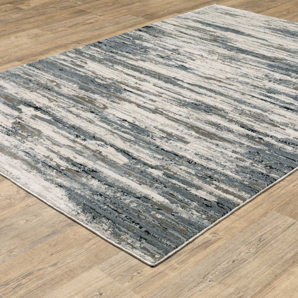 10' X 13' Blue Grey Beige And Brown Abstract Power Loom Stain Resistant Area Rug - Homeroots - Flyclothing LLC
