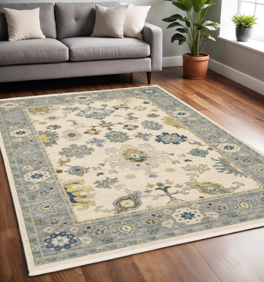 5' X 8' Ivory Blue Grey Teal Gold Green And Rust Oriental Power Loom Stain Resistant Area Rug With Fringe - Homeroots - Flyclothing LLC