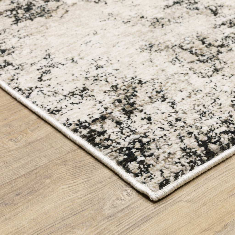 8' X 11' Ivory Grey Black Beige And Tan Abstract Power Loom Stain Resistant Area Rug - Homeroots - Flyclothing LLC