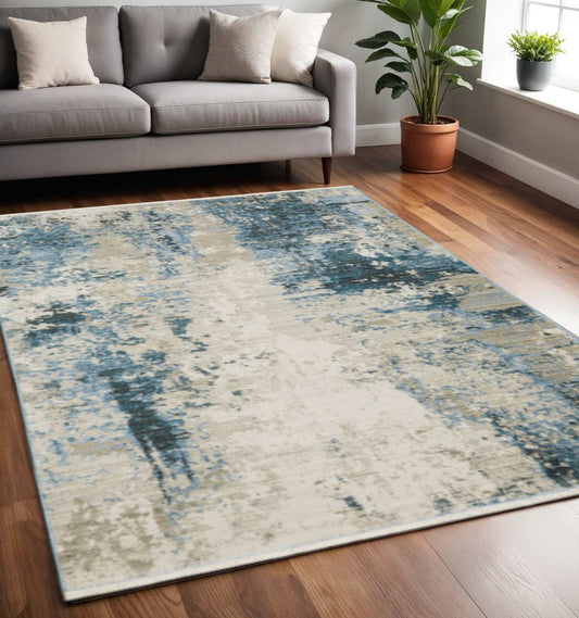 5' X 8' Blue Grey Ivory Light Blue And Dark Blue Abstract Power Loom Stain Resistant Area Rug With Fringe - Homeroots - Flyclothing LLC