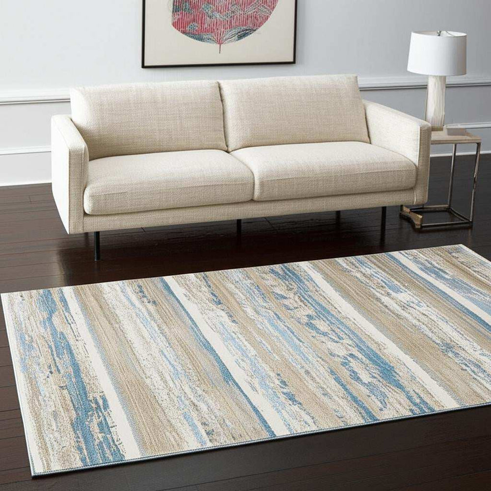 5' X 8' Ivory Beige Grey Blue And Tan Abstract Power Loom Stain Resistant Area Rug With Fringe - Homeroots - Flyclothing LLC