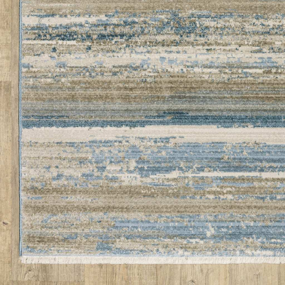 5' X 8' Ivory Beige Grey Blue And Tan Abstract Power Loom Stain Resistant Area Rug With Fringe - Homeroots - Flyclothing LLC