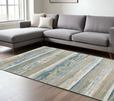 8' X 11' Ivory Beige Grey Blue And Tan Abstract Power Loom Stain Resistant Area Rug With Fringe - Homeroots - Flyclothing LLC