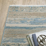 10' X 13' Ivory Beige Grey Blue And Tan Abstract Power Loom Stain Resistant Area Rug With Fringe - Homeroots - Flyclothing LLC