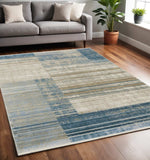 5' X 8' Blue Dark Blue Teal Grey Ivory Beige And Tan Geometric Power Loom Stain Resistant Area Rug With Fringe - Homeroots - Flyclothing LLC