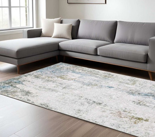 8' X 10' Ivory Teal Blue Grey Brown And Gold Abstract Printed Stain Resistant Non Skid Area Rug - Homeroots - Flyclothing LLC