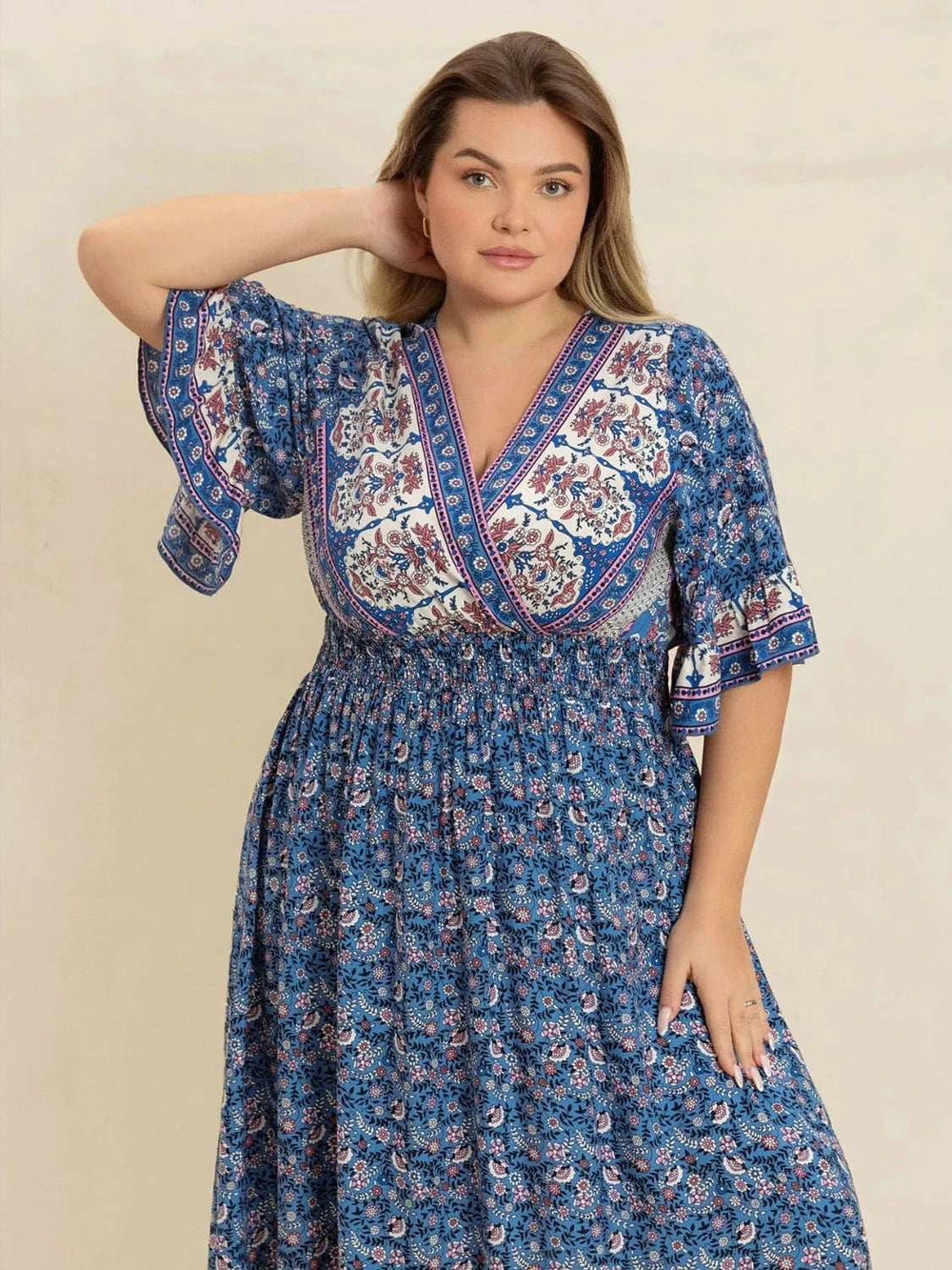 Plus Size Printed Surplice Half Sleeve Dress - Trendsi - Flyclothing LLC