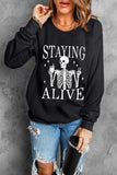 Skull Graphic Round Neck Long Sleeve Sweatshirt - Trendsi - Flyclothing LLC