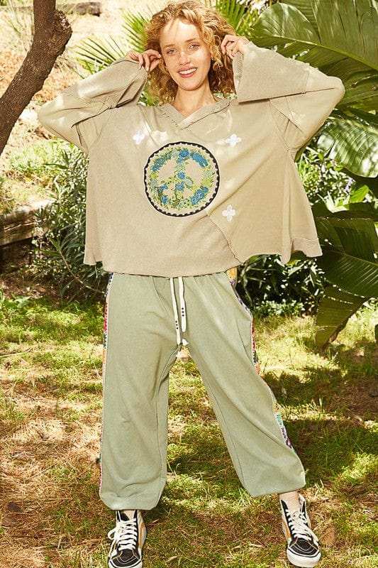 POL Peace Embroidered Exposed Seam Back Ruffle V-Neck Top - Trendsi - Flyclothing LLC