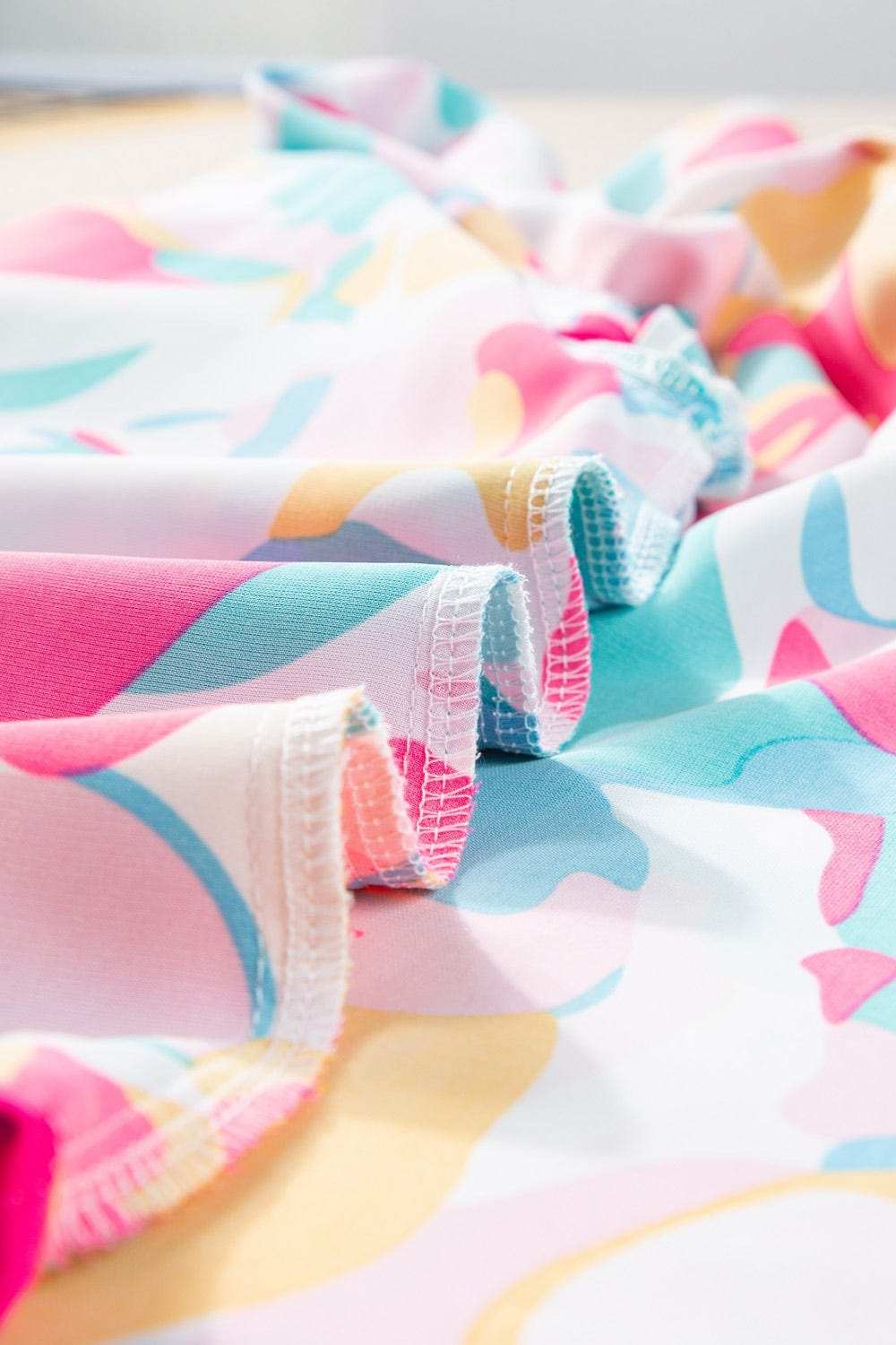 Plus Size Ruffled Printed Notched Cap Sleeve Blouse - Trendsi - Flyclothing LLC