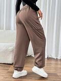 Tied Joggers with Pockets - Trendsi - Flyclothing LLC