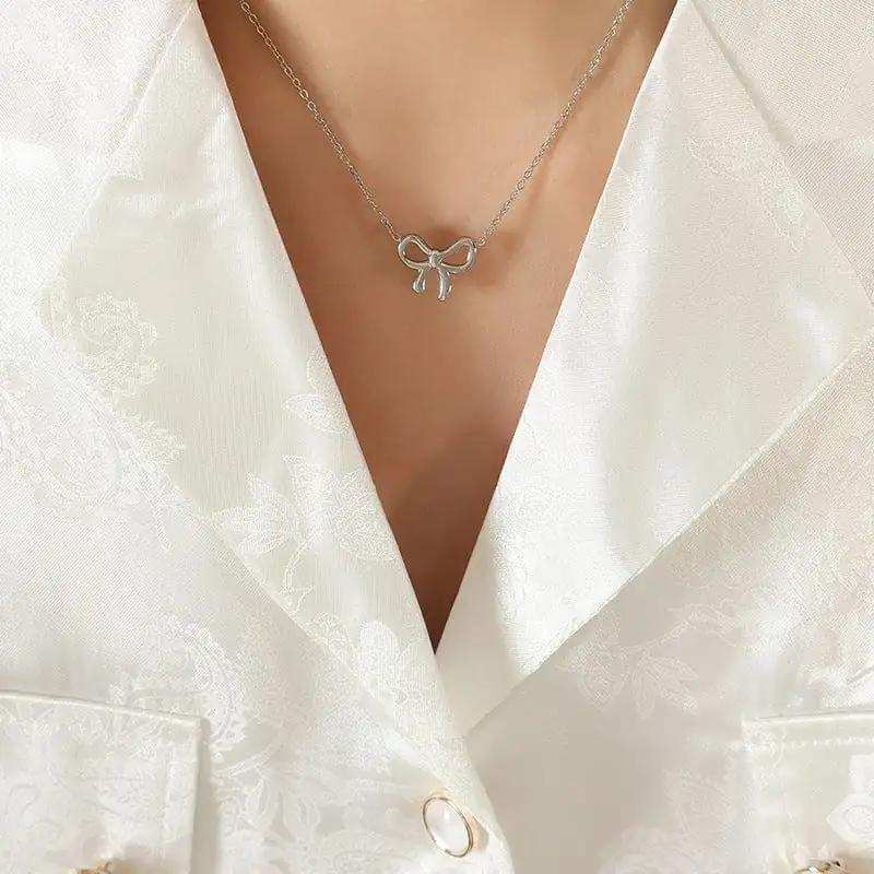 Titanium Steel Bow Pendant Necklace - Trendsi - Flyclothing LLC