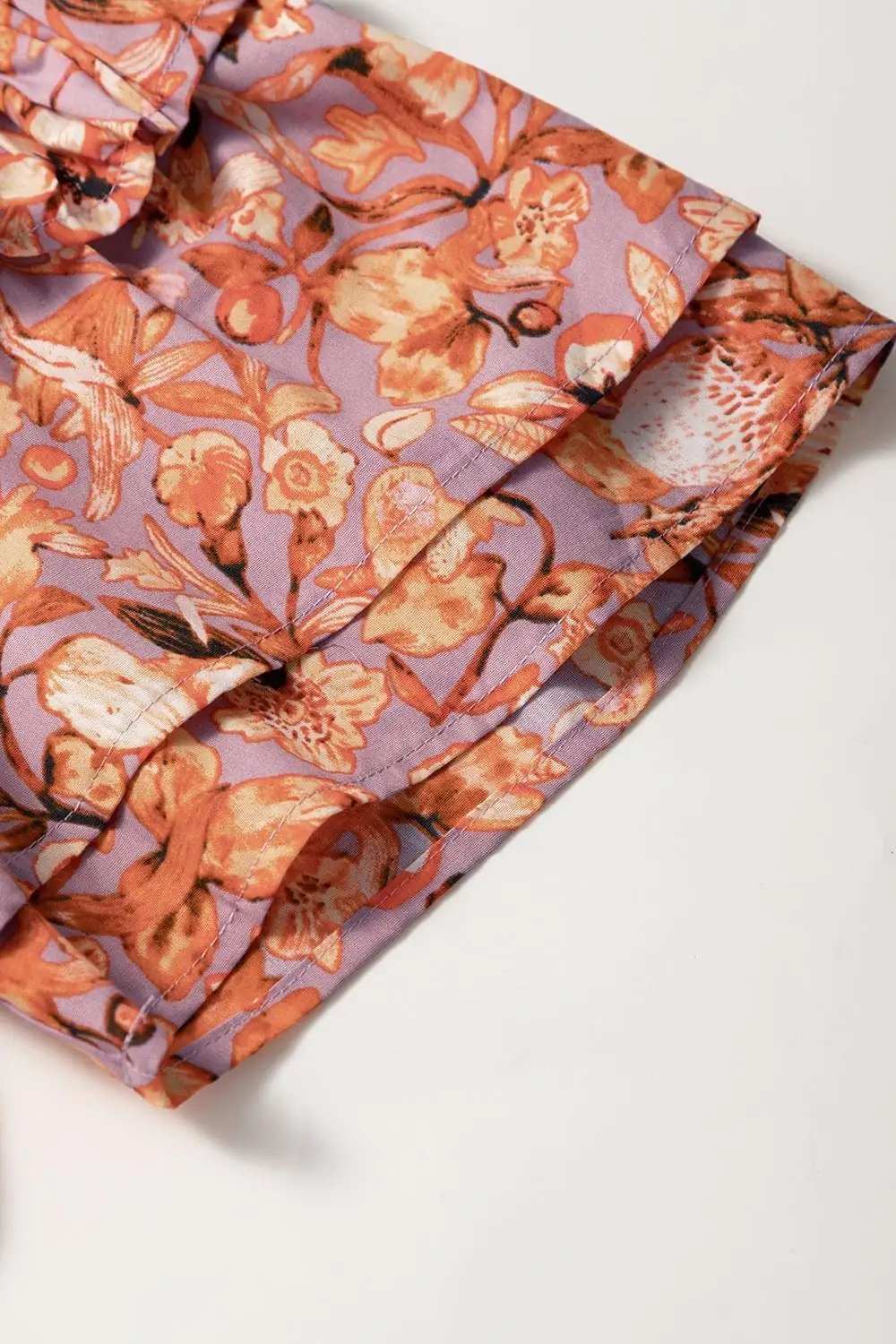 Floral Ruffled Layered Short Sleeve Tie Neck Blouse - Trendsi - Flyclothing LLC