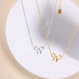 Titanium Steel Bow Pendant Necklace - Trendsi - Flyclothing LLC
