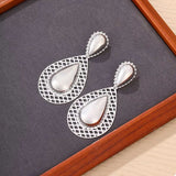 Hollowed-Out Teardrop Statement Earrings - Trendsi - Flyclothing LLC