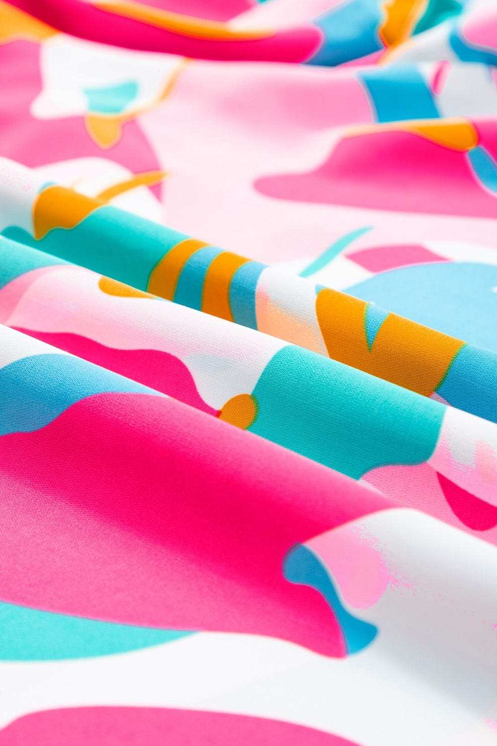 Plus Size Ruffled Printed Notched Cap Sleeve Blouse - Trendsi - Flyclothing LLC