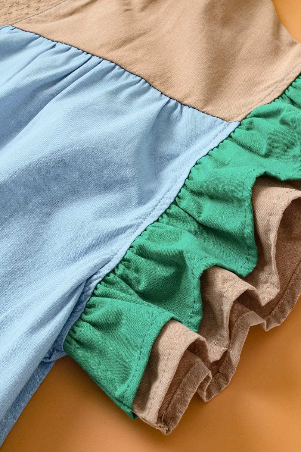 Color Block Notched Ruffled Cap Sleeve Blouse - Trendsi - Flyclothing LLC