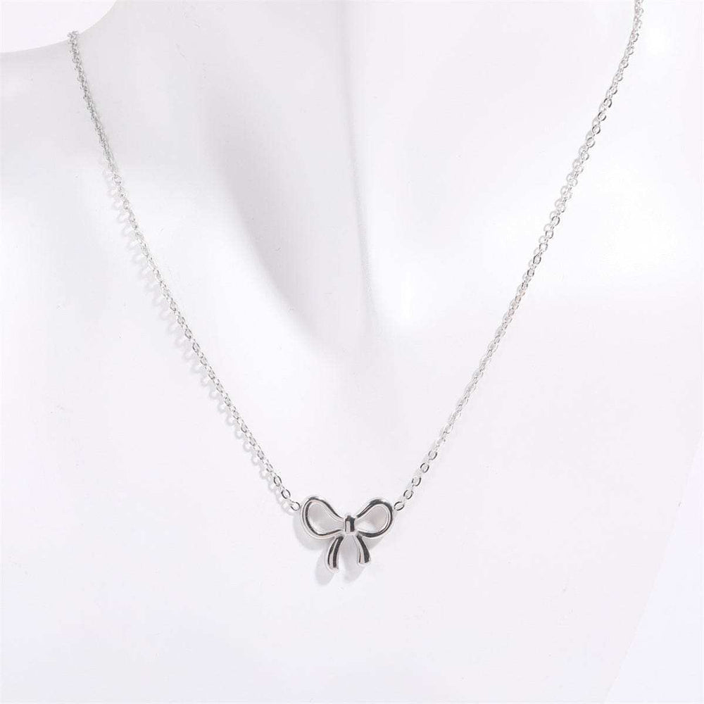 Titanium Steel Bow Pendant Necklace - Trendsi - Flyclothing LLC