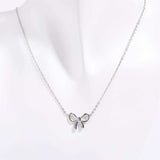 Titanium Steel Bow Pendant Necklace - Trendsi - Flyclothing LLC