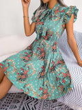 Pleated Floral Printed Tie Neck Knee Length Dress - Trendsi - Flyclothing LLC