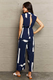 Printed Round Neck Cutout Jumpsuit with Pockets - Trendsi - Flyclothing LLC
