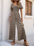 Perfee Smocked Printed Square Neck Puff Sleeve Jumpsuit - Trendsi