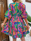 Ruffled Printed V-Neck Half Sleeve Mini Dress - Trendsi