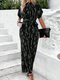 Tied Printed Mock Neck Wide Leg Jumpsuit - Trendsi