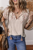 Geometric Embroidered Short Sleeve Tassel Tie Neck Blouse - Trendsi