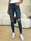 Judy Blue Full Size Mid Waist Distressed Slim Jeans - Trendsi